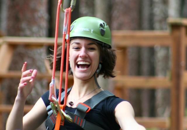 woman ziplining at grizzly falls