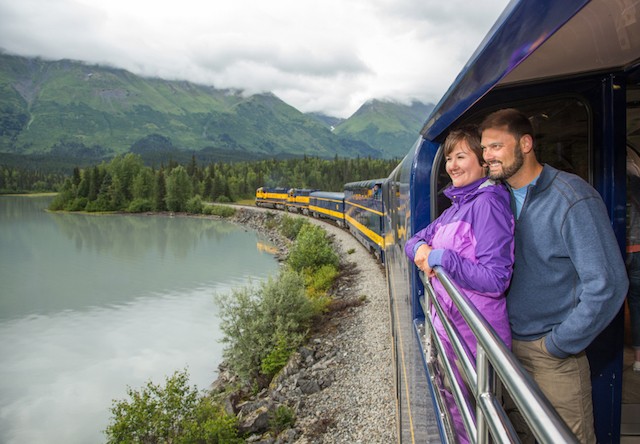 couple enjoys views from train