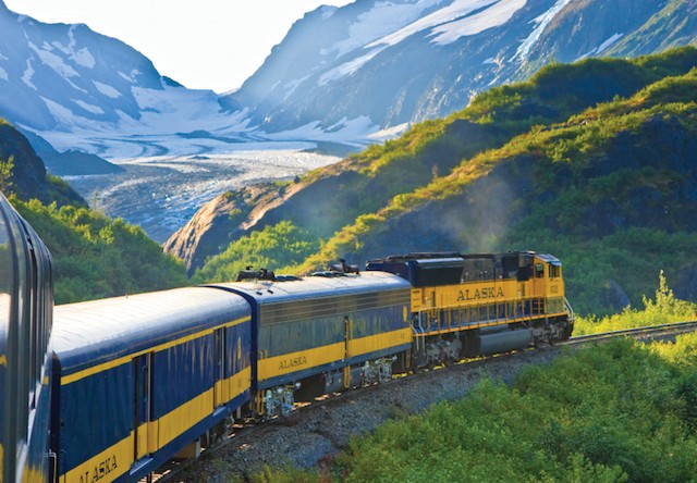 train glides between mountains